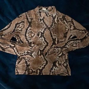 Snake skin printed turtle neck